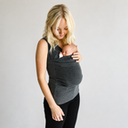 Mom carrying newborn in the Nesting Mom Shirt — NAEVII