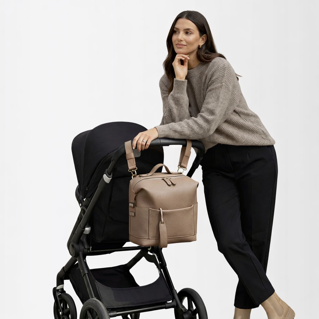 Lumi diaper bag carried on the shoulder — NAEVII