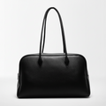 Muse diaper bag leather finish close-up — NAEVII