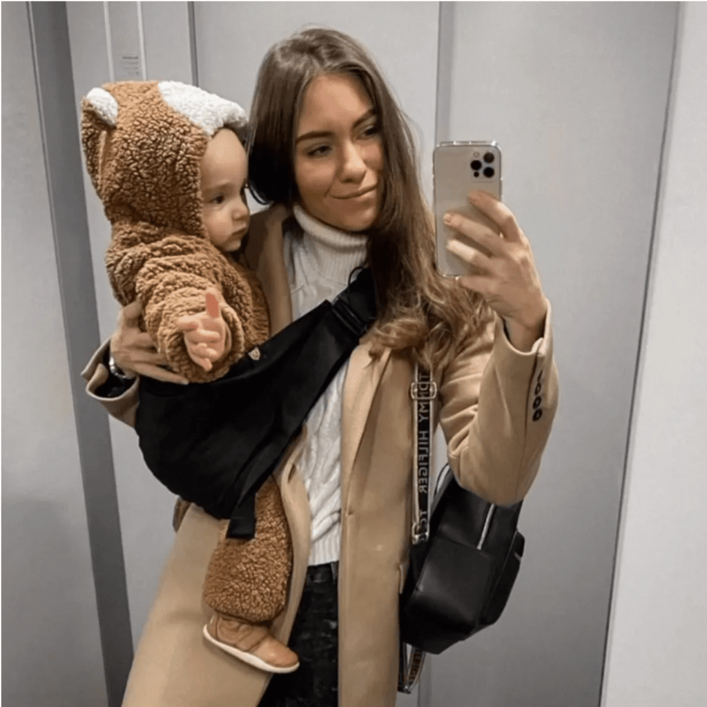 Toddler sling carrier worn on a walk — NAEVII