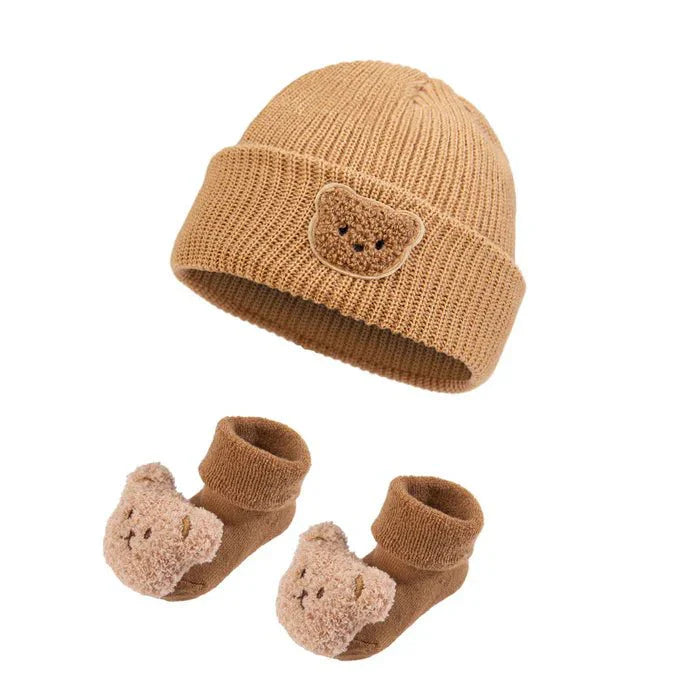 Cozy Bear plush toy held in hands — NAEVII